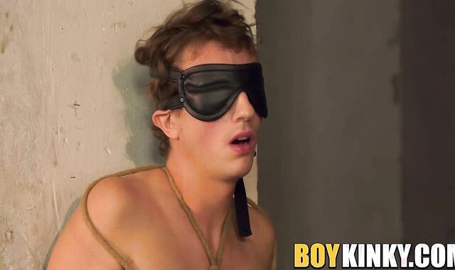 Bound blindfolded twink slave receives handjob from master