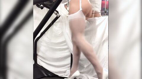 Crossdresser in White Stockings on Treadmill