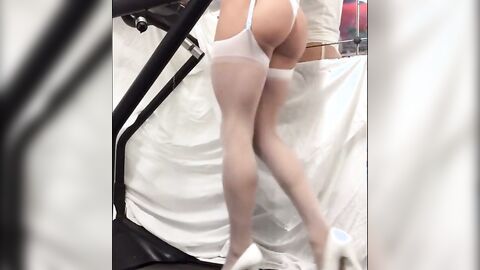 Crossdresser in White Stockings on Treadmill