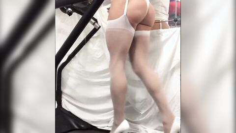 Crossdresser in White Stockings on Treadmill