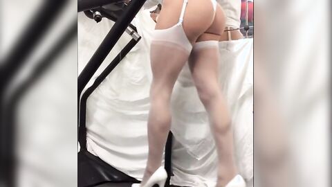 Crossdresser in White Stockings on Treadmill
