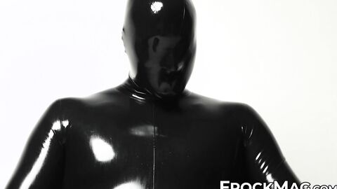 Sexy Rubber Shadow pleasures and strokes his locked cock in wearing a full black rubb