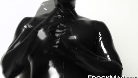 Sexy Rubber Shadow pleasures and strokes his locked cock in wearing a full black rubb