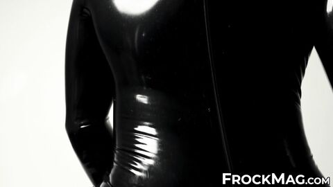 Sexy Rubber Shadow pleasures and strokes his locked cock in wearing a full black rubb