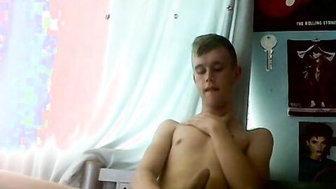 Cute Brit twink stroking his long hard uncut cock for you