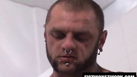 Tattooed gay spills enema on facesitting lover