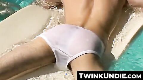 TwinkUndie.com - Zack Randall gives Mike Roberts a teasy underwater handjob by the po