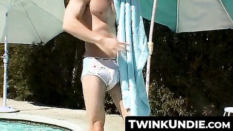 TwinkUndie.com - Zack Randall gives Mike Roberts a teasy underwater handjob by the po