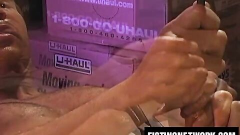 Pierced Simon Cox gets ass fisted open by Xavier Vitale