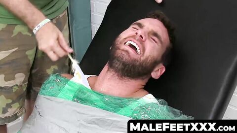 MaleFeetXXX.com - Bearded restrained jock Chase Lachance tickled by master