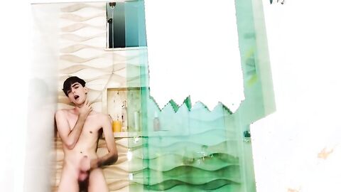 Twink Henry Evans strokes his cock to climax in the bathroom