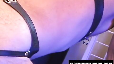 Eric Michaels in jock strap gets wild fisting from Bobby Black