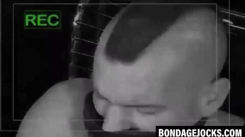 Inked man was tied up and subdued wearing only underwear