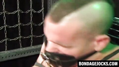 Inked man was tied up and subdued wearing only underwear