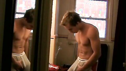 Kelly Cooper is teasing in front of the mirror in undies