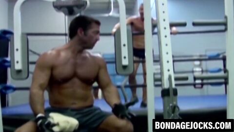 Inked hunk choked and dominated after losing a wrestling match