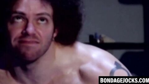 Inked hunk choked and dominated after losing a wrestling match