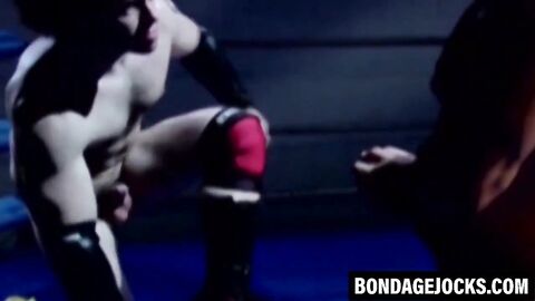 Wrestler dominates his lover while stroking his cock