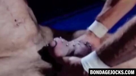 Submissive man choked in a rough dominating threesome