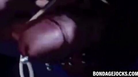 Submissive man choked in a rough dominating threesome