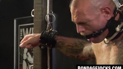 Rough bondage with a hunk who craves torment and pain