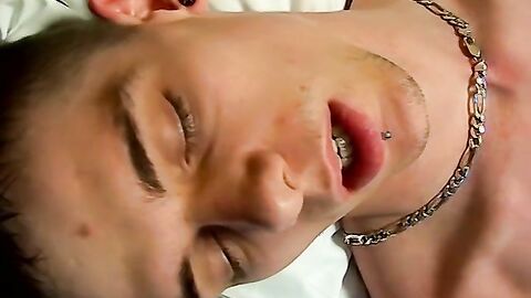 Twinkie puts a condom on his hard dick and masturbates