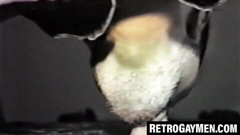 Vintage jock throatfucked hard through glory hole wall