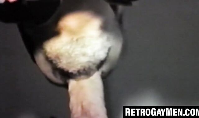 Vintage jock throatfucked hard through glory hole wall