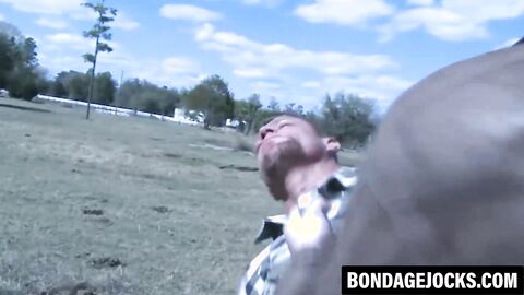 Submissive jock dominated outdoors by wild hunk