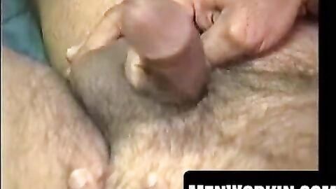 Hairy Shawn strokes his cock hard on the bed