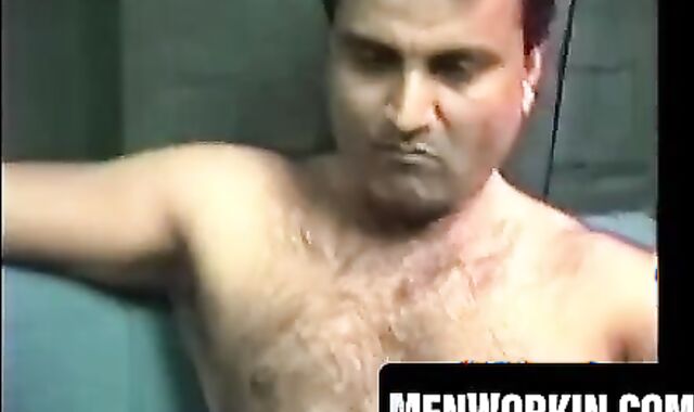 Hairy Shawn strokes his cock hard on the bed
