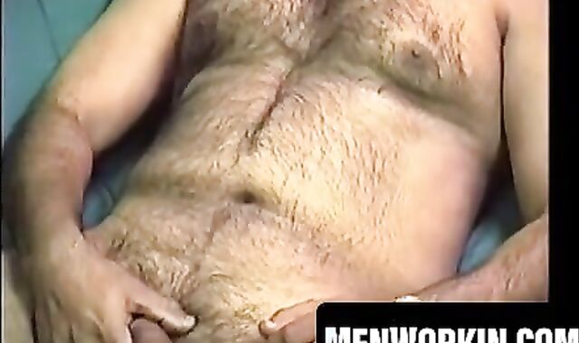 Hairy Shawn strokes his cock hard on the bed