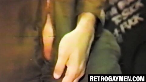 Retro stud throatfucks for cumshot at glory hole