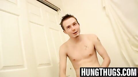 Billy and Damien stroke hard cocks in hallway