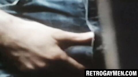 Muscled gays service glory holes with hungry mouths