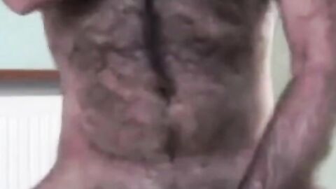 Hairy Daddy Strokes His Cock