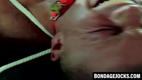 Bondage gay fingered and jerked off in intense BDSM play