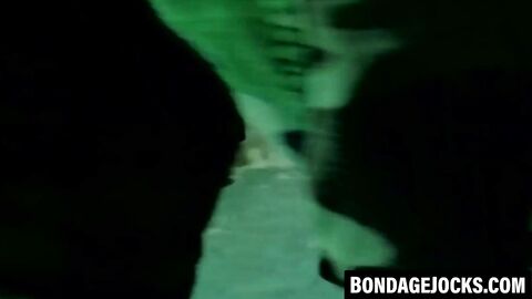 Handsome jock dominated after sweaty gym bondage session