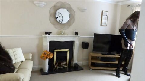 Transvestite in Thigh Boots Plays with Butt Plug