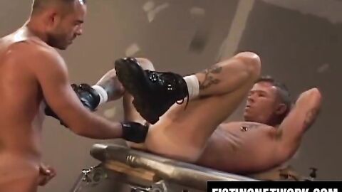 Taurus Dean fists Chris Neal after passionate kissing