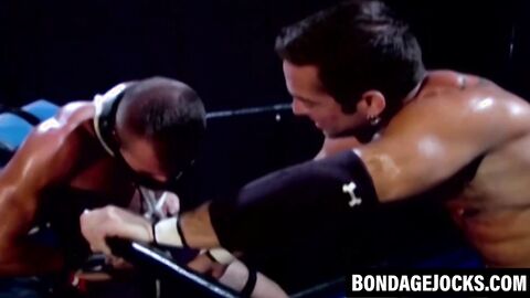 Wild wrestler submits to brutal domination in BDSM scene