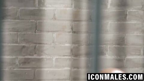 Mature inmate fucks twink hard against prison cell bars