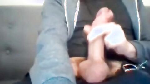 Hunky Guy Strokes His Massive Cock and Nuts on Webcam