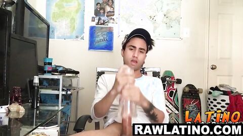 Tattooed Latino twink tugs his fat dick till eruption