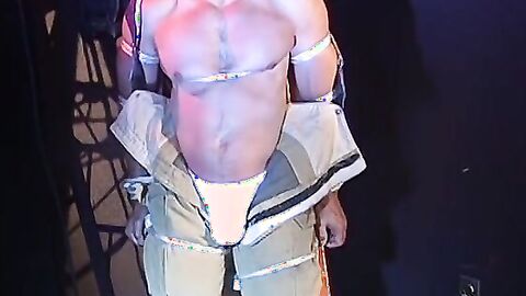 Muscular man bound tight waiting for torment from the captor
