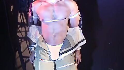 Muscular man bound tight waiting for torment from the captor