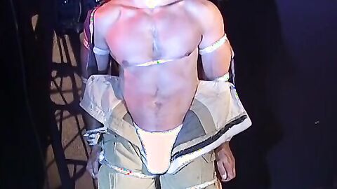 Muscular man bound tight waiting for torment from the captor