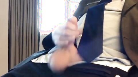 Suited Silver Fox Jerks Off Solo