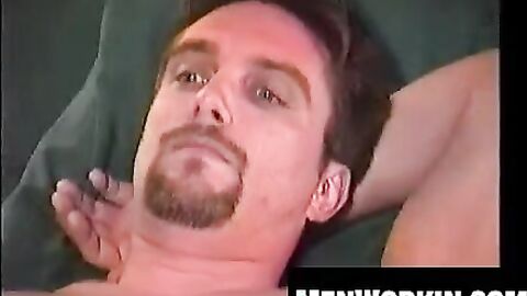 Hot hunk grips his massive sword and jerks it off