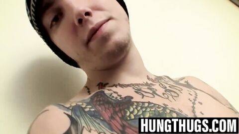 Tattooed jock strokes hard cock for hungry fans